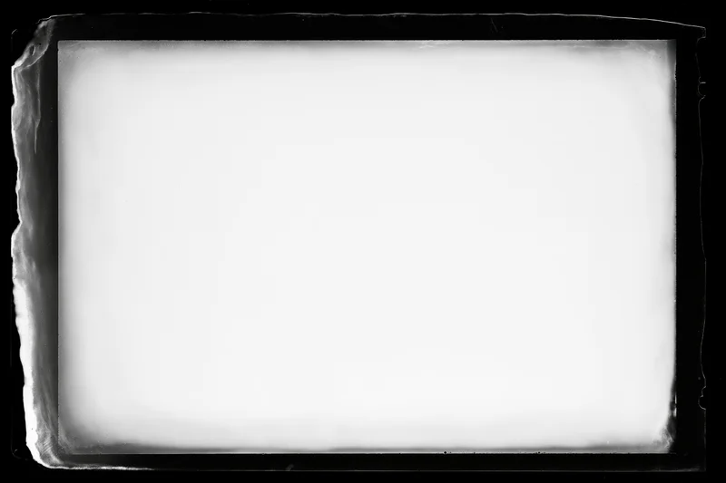 Blank analog film frame with darkened edges and white center area