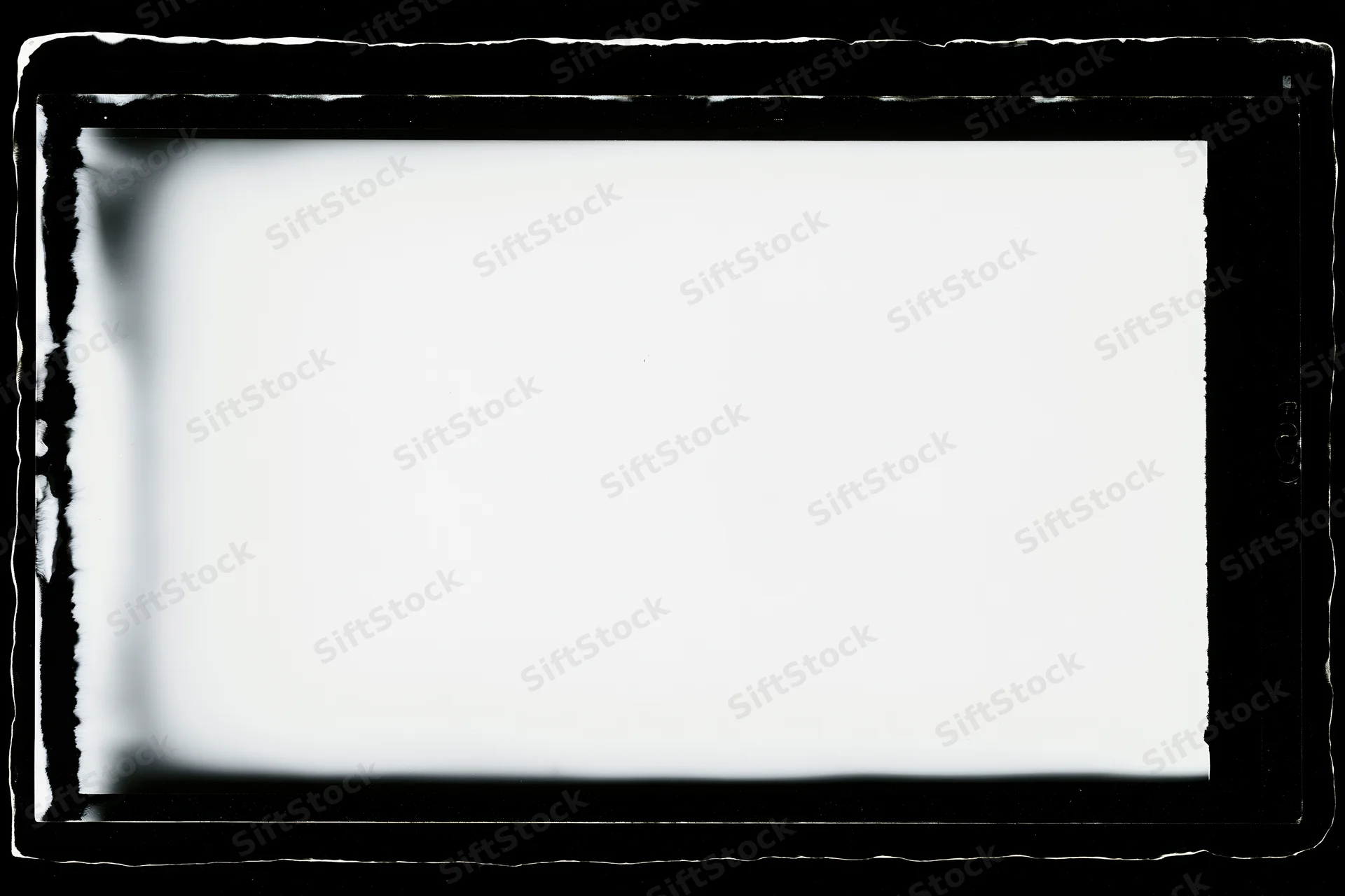 Blank analog film frame in large format negative holder with dark borders and white center