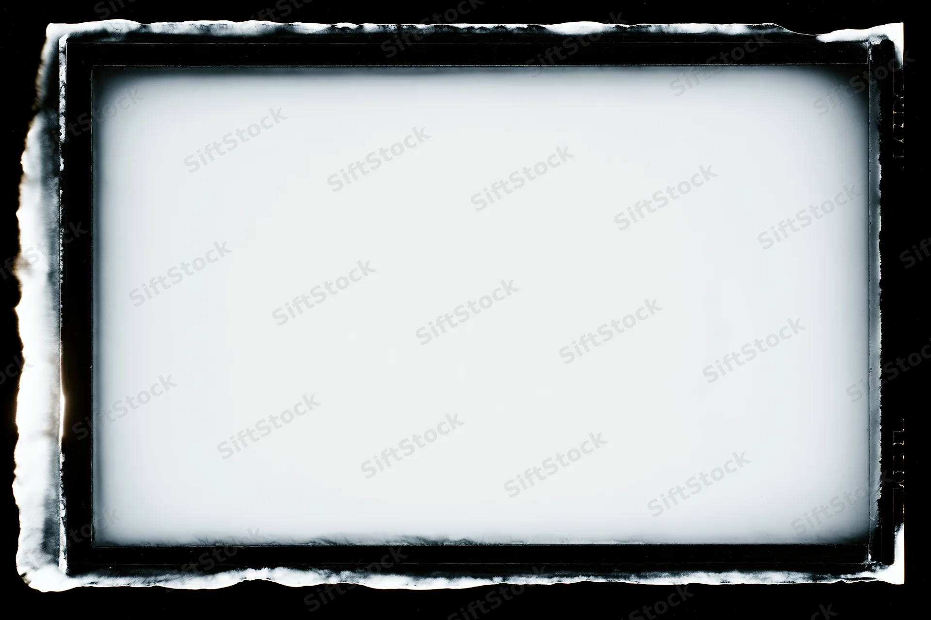 Blank analog film frame with dark textured border on black background