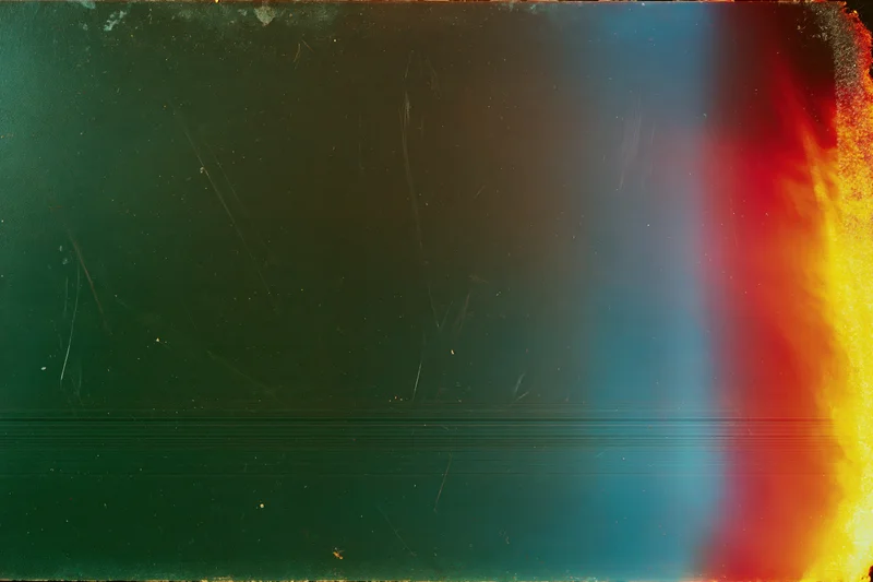 Damaged analog film frame with light leak and scratches across the surface
