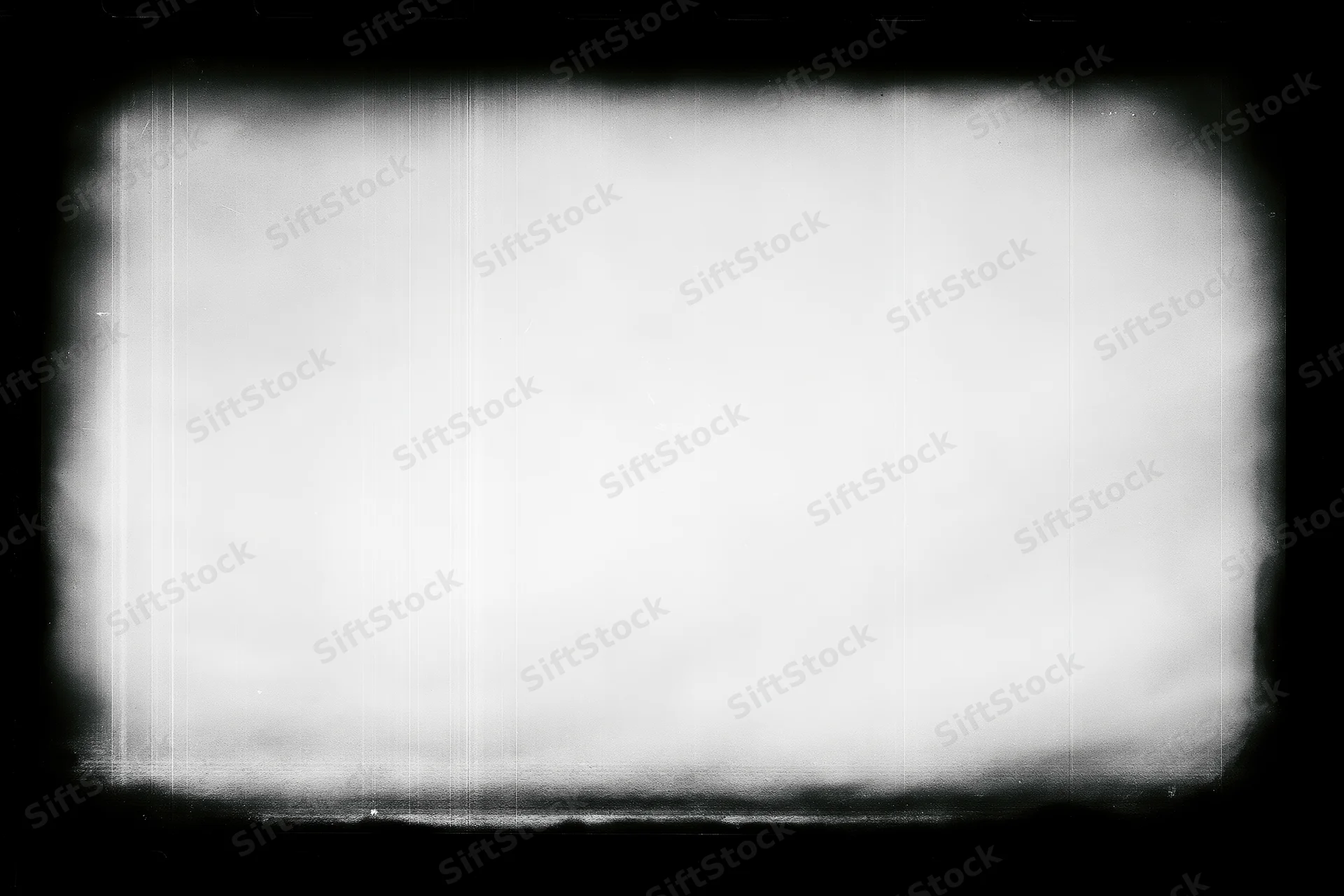 Blank overexposed film frame with heavy black vignette edges