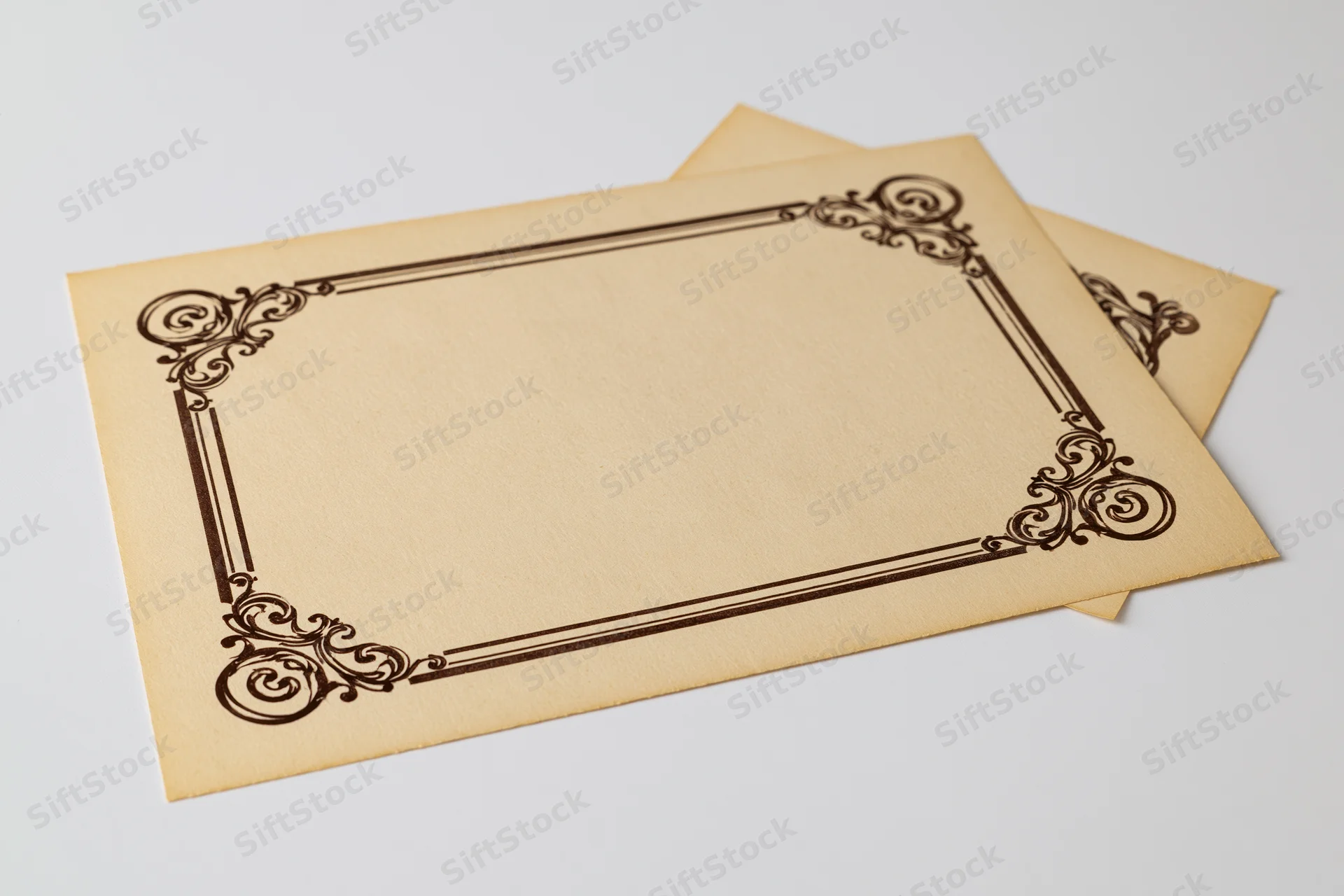 Vintage certificate template with ornate border on aged paper, isolated on white background