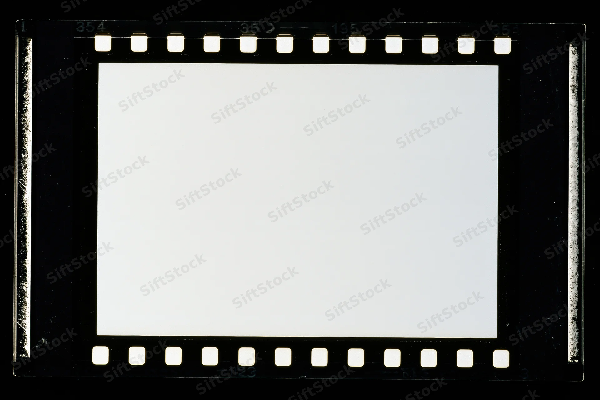 Blank 35mm film negative frame with sprocket holes on black background