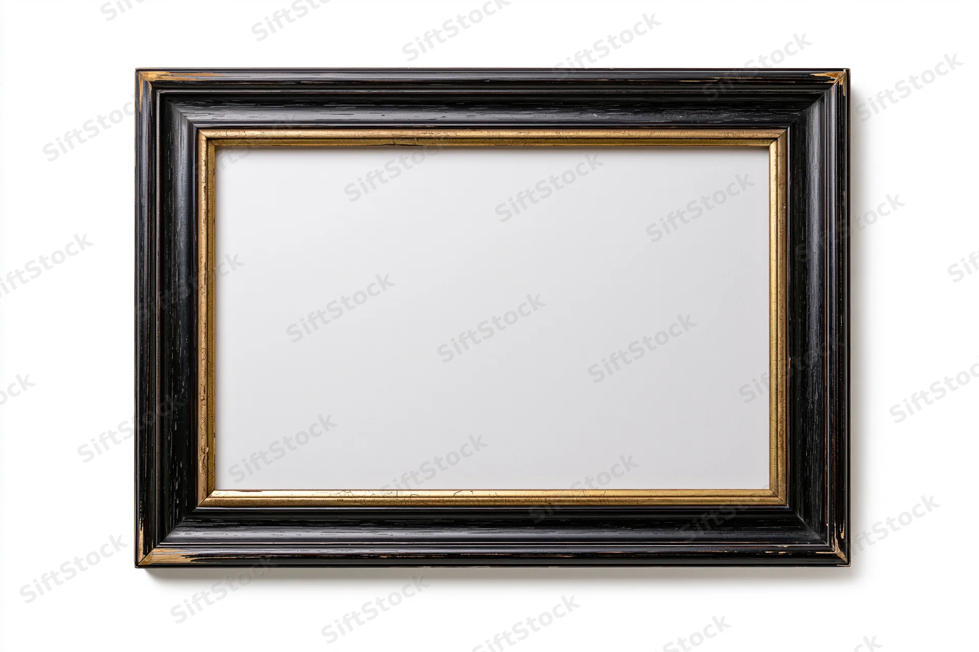 Empty classic wooden picture frame with black and gold finish isolated on white background