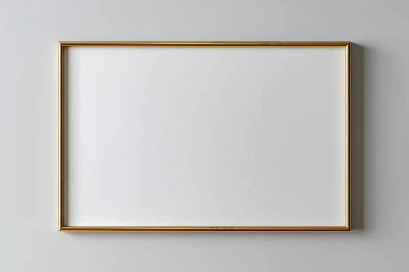 Thin gold frame with white blank canvas hanging on a light gray wall