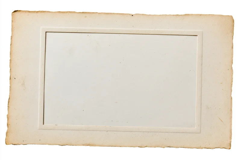 Vintage photo print border with aged paper frame lying flat on white background