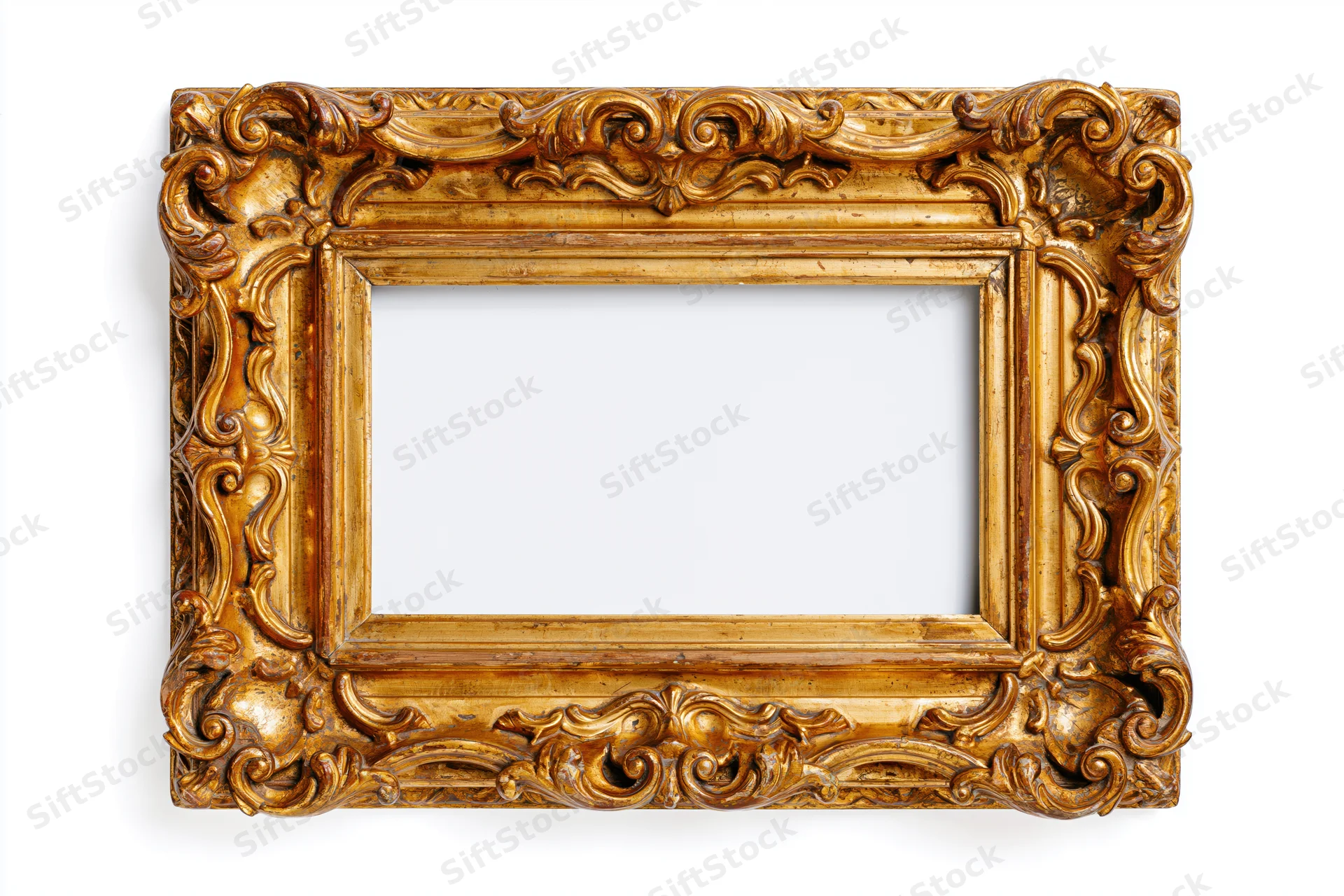 Ornate antique gold picture frame with intricate carvings and scrollwork, isolated on white background