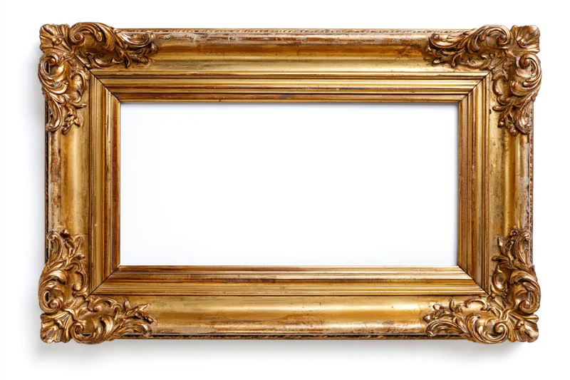Ornate antique gold picture frame with baroque carved floral details isolated on white background