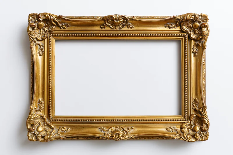 Ornate antique gold picture frame with empty white interior