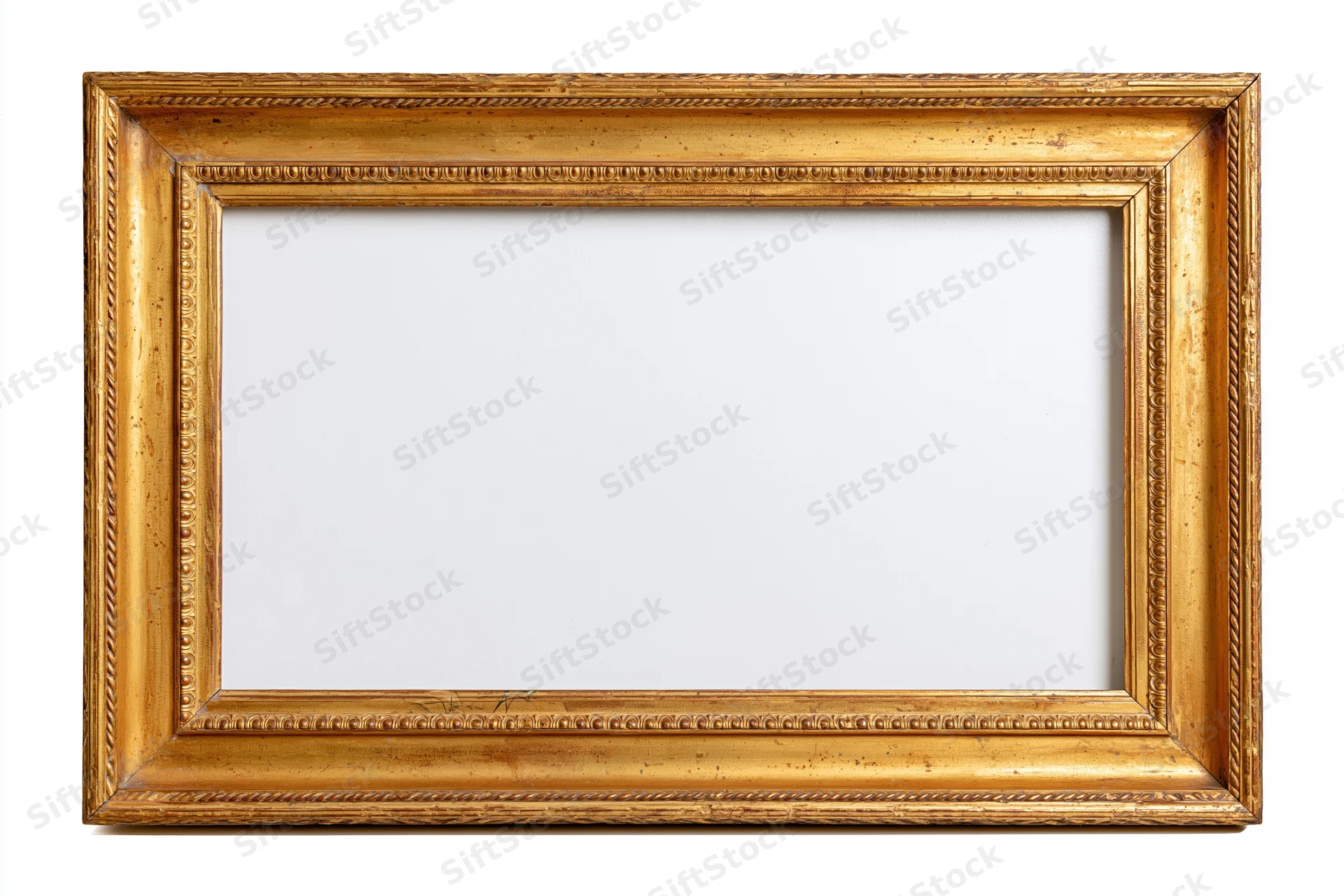 Ornate gilded wooden picture frame with detailed molding photographed flat against white background