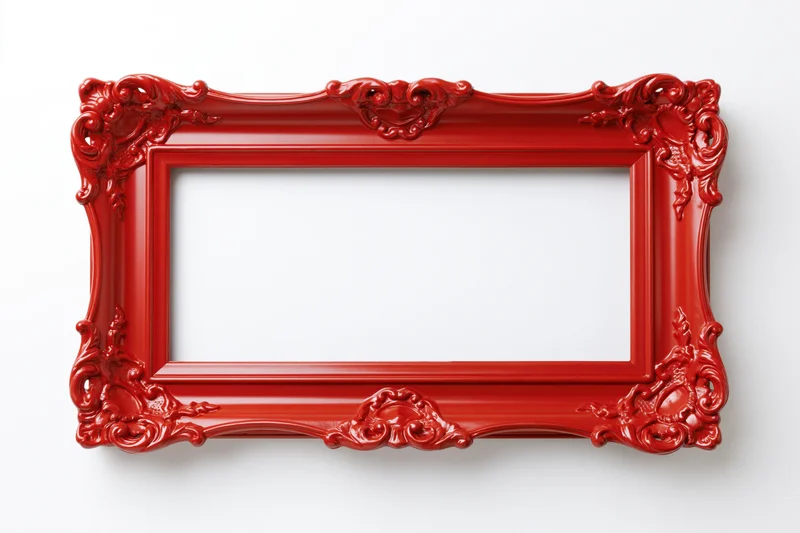 Ornate red vintage picture frame with decorative carvings isolated on white background