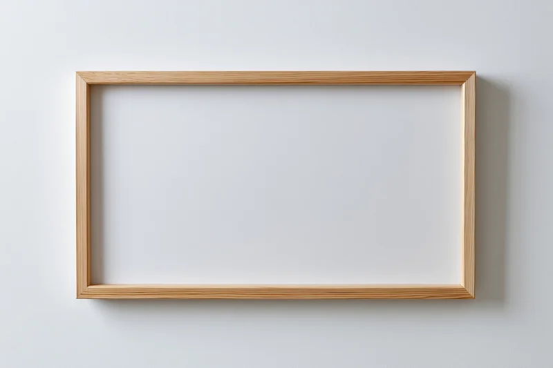 Light natural wood rectangular picture frame hanging on white wall with blank interior