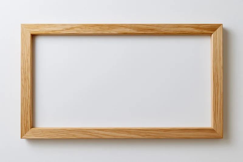 Wooden picture frame hanging on a white wall with empty interior