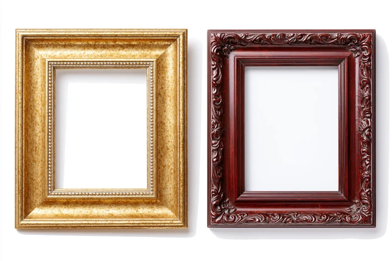 Two ornate picture frames side by side against a plain white background