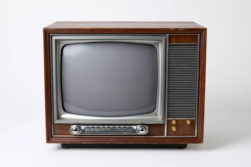 Vintage television set with blank screen isolated on white background