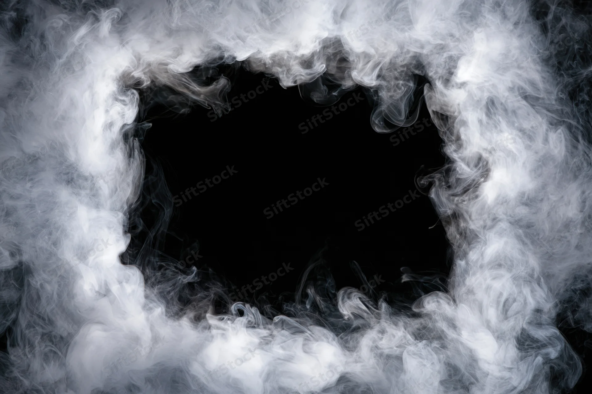 White smoke forming a rectangular frame around a black void with copyspace in the center