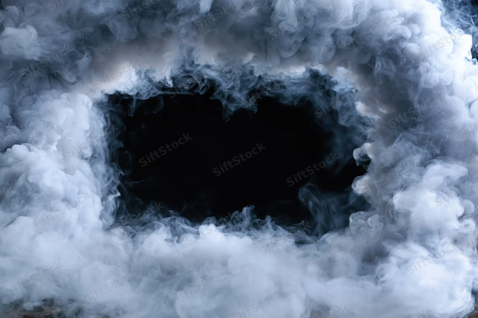 White smoke forming a rectangular frame around a dark void
