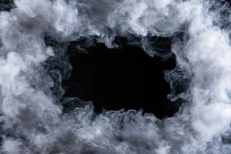 White smoke and fog forming rectangular frame around center