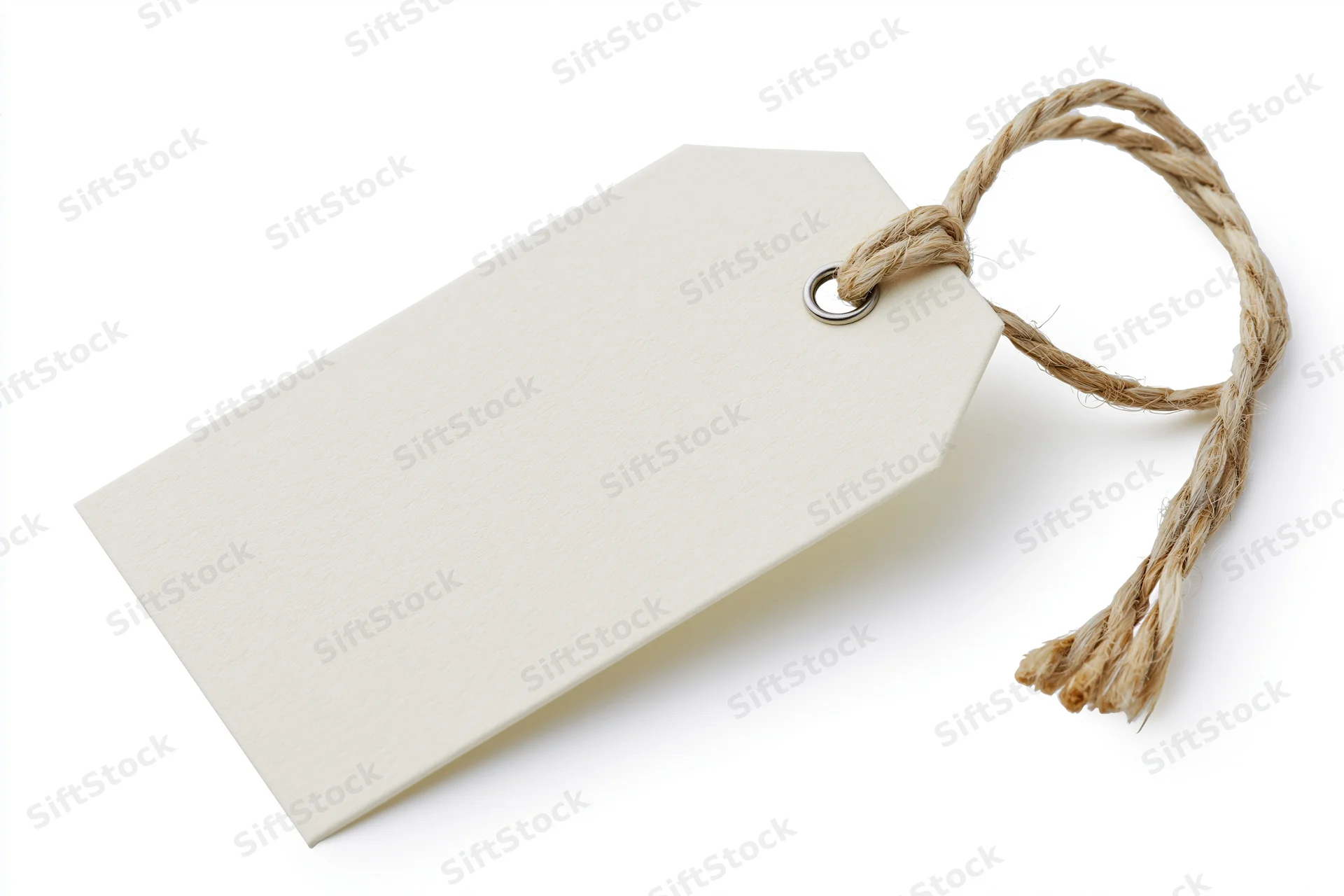 Blank cream cardboard tag with twisted twine string on white background