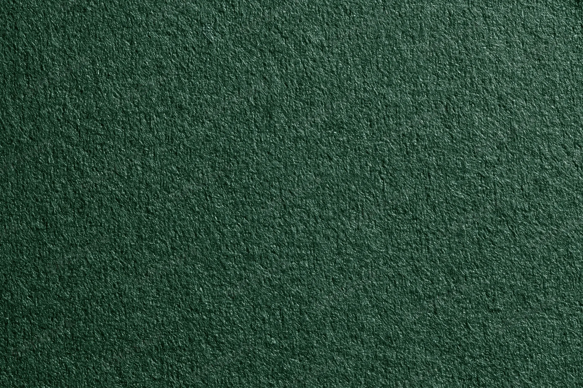 Close-up of dark forest green ribbed fabric texture filling the frame