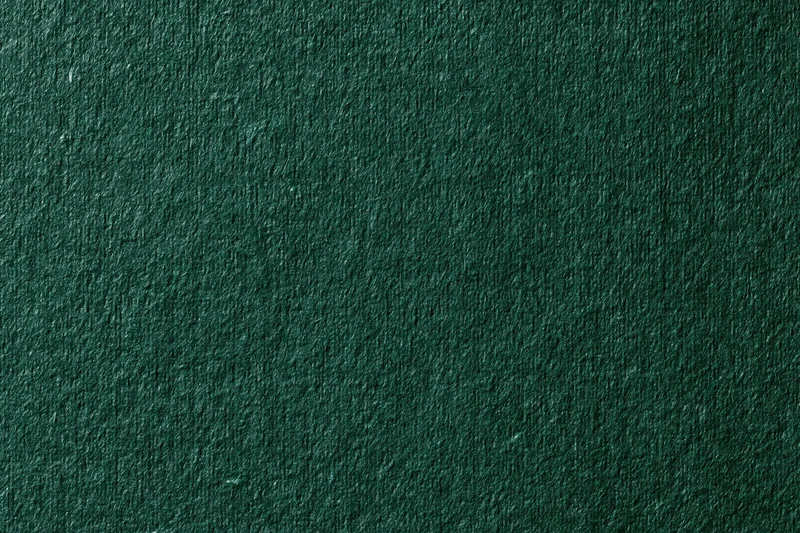 Close-up of dark forest green ribbed fabric texture