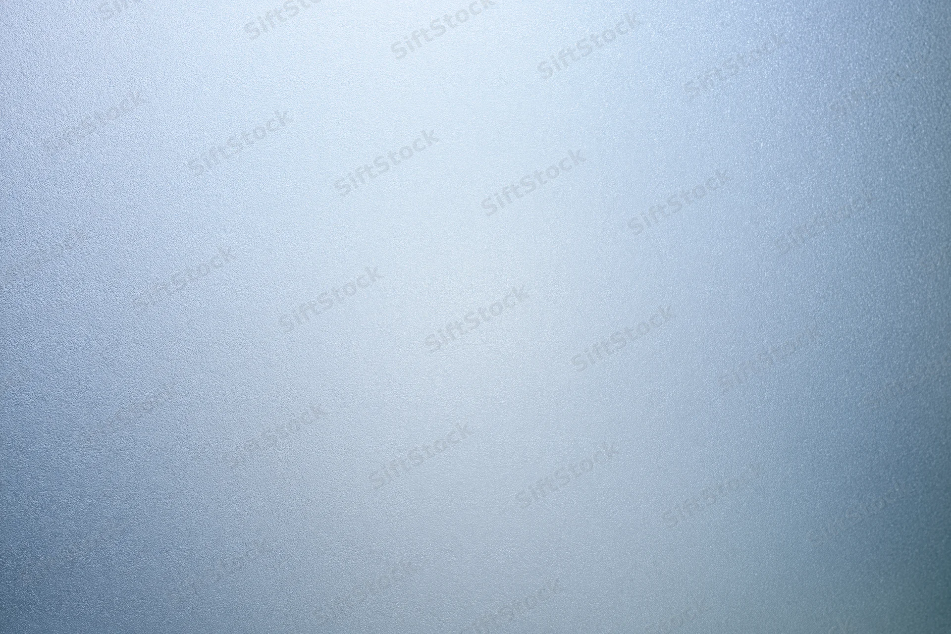 Frosted glass surface with subtle texture and light gradient filling the frame