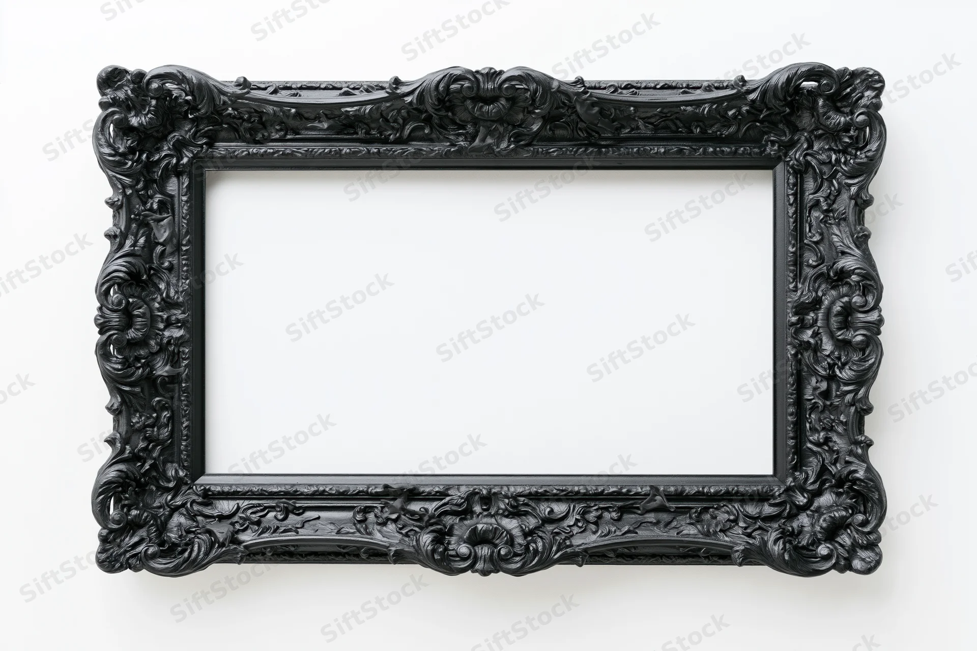 Ornate black baroque picture frame with intricate carvings and empty center against white background