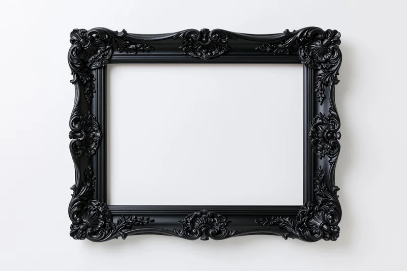 Ornate black baroque picture frame hanging flat against white wall with empty center for display