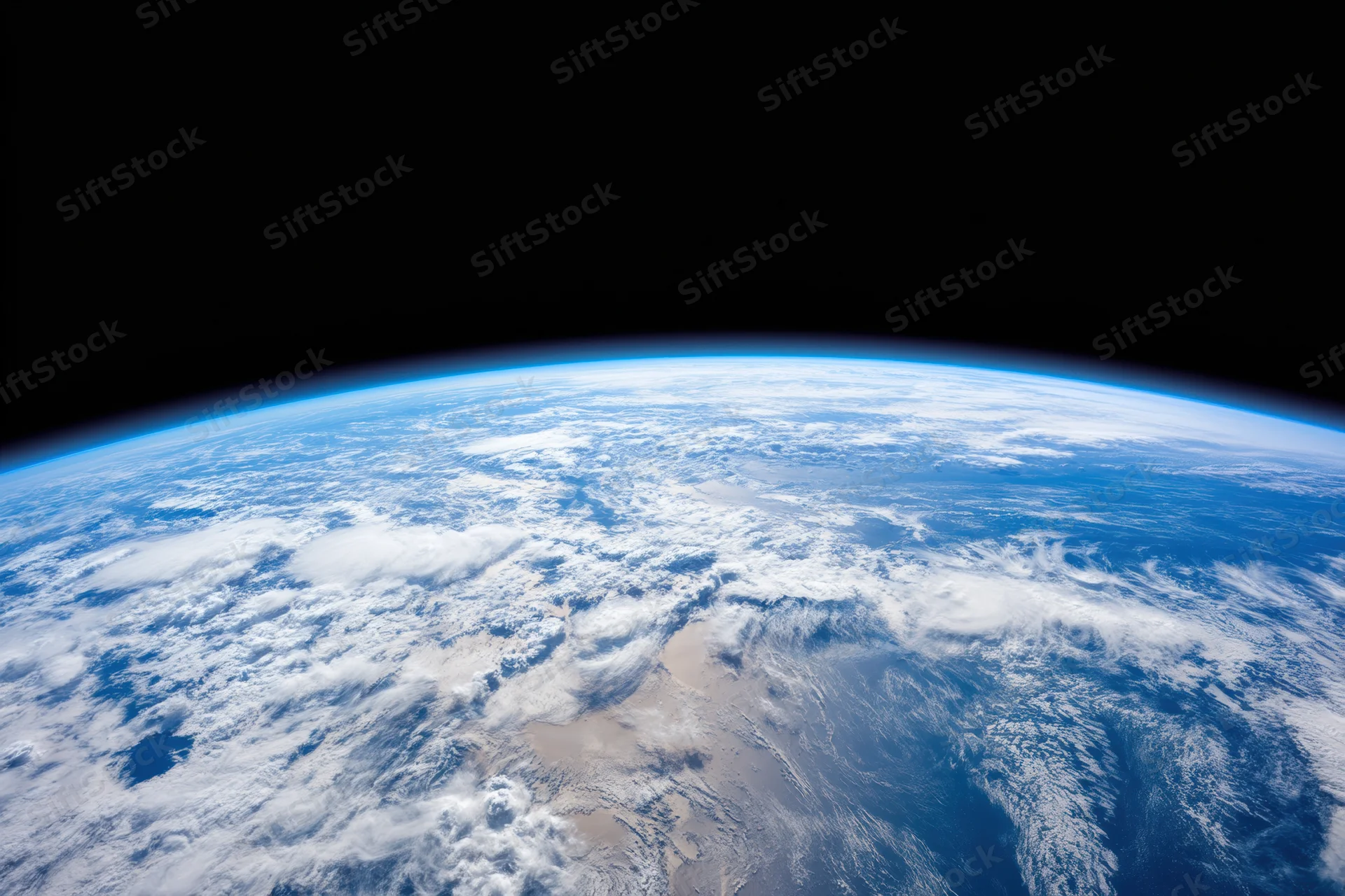 Earth viewed from orbit showing blue oceans, white clouds and landmasses against black space