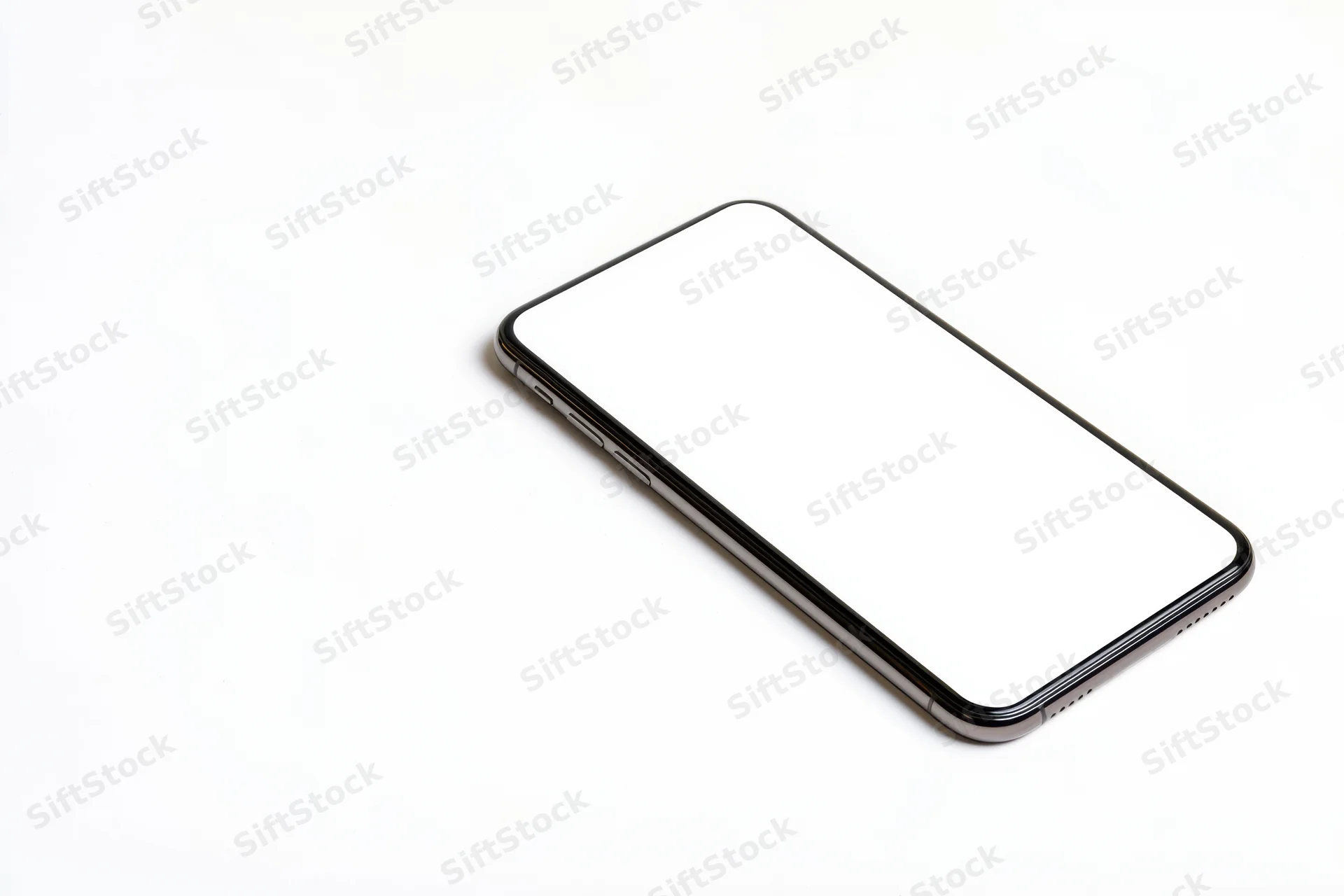Sleek smartphone with blank white screen angled on white background