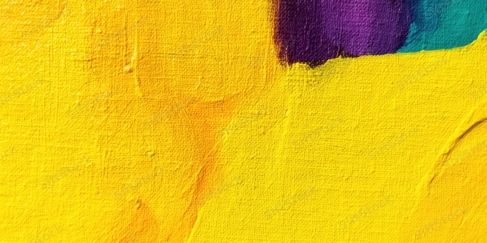 Close-up of textured canvas with bright yellow paint and purple and teal accents