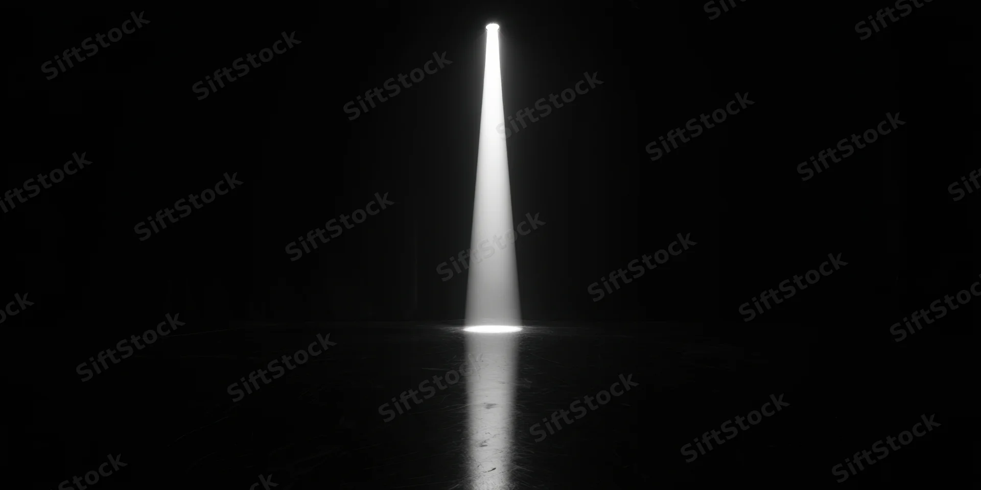 Single spotlight beam on dark empty stage floor