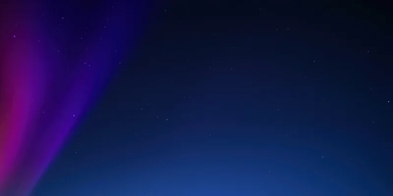 Sweeping aurora of purple and magenta across dark night sky with stars