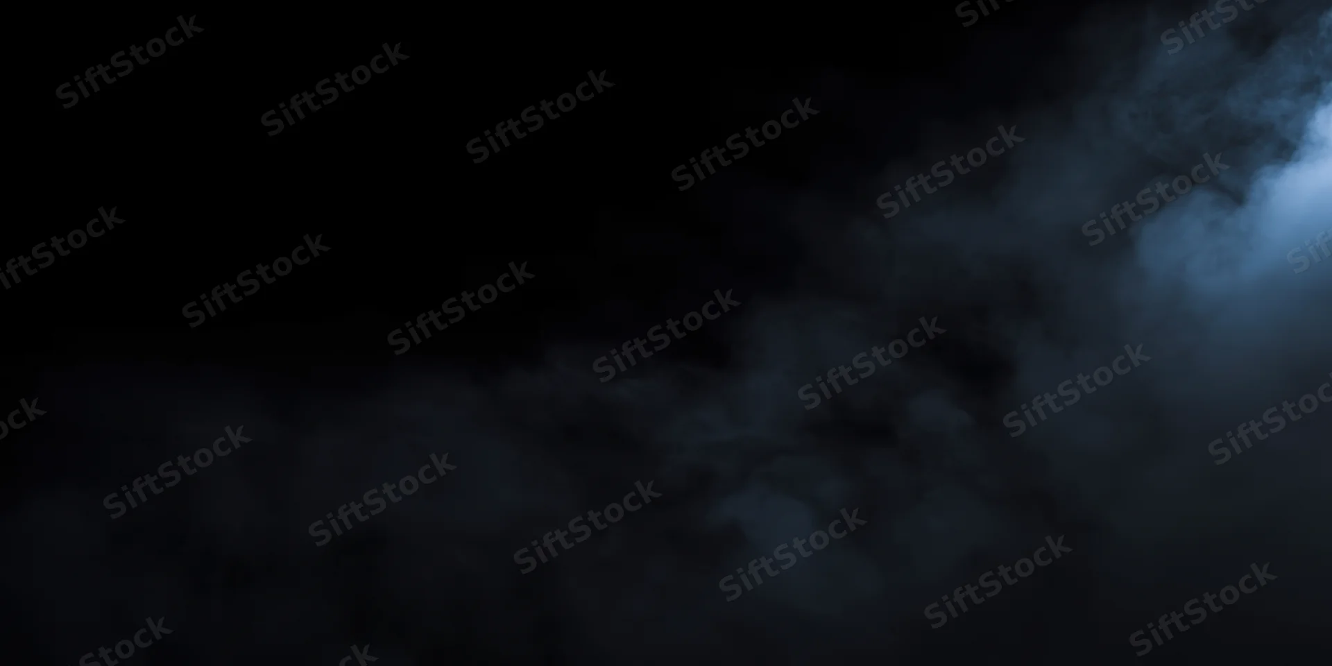 Dark plume of smoke drifting across black background with blue-tinged wisps and copyspace