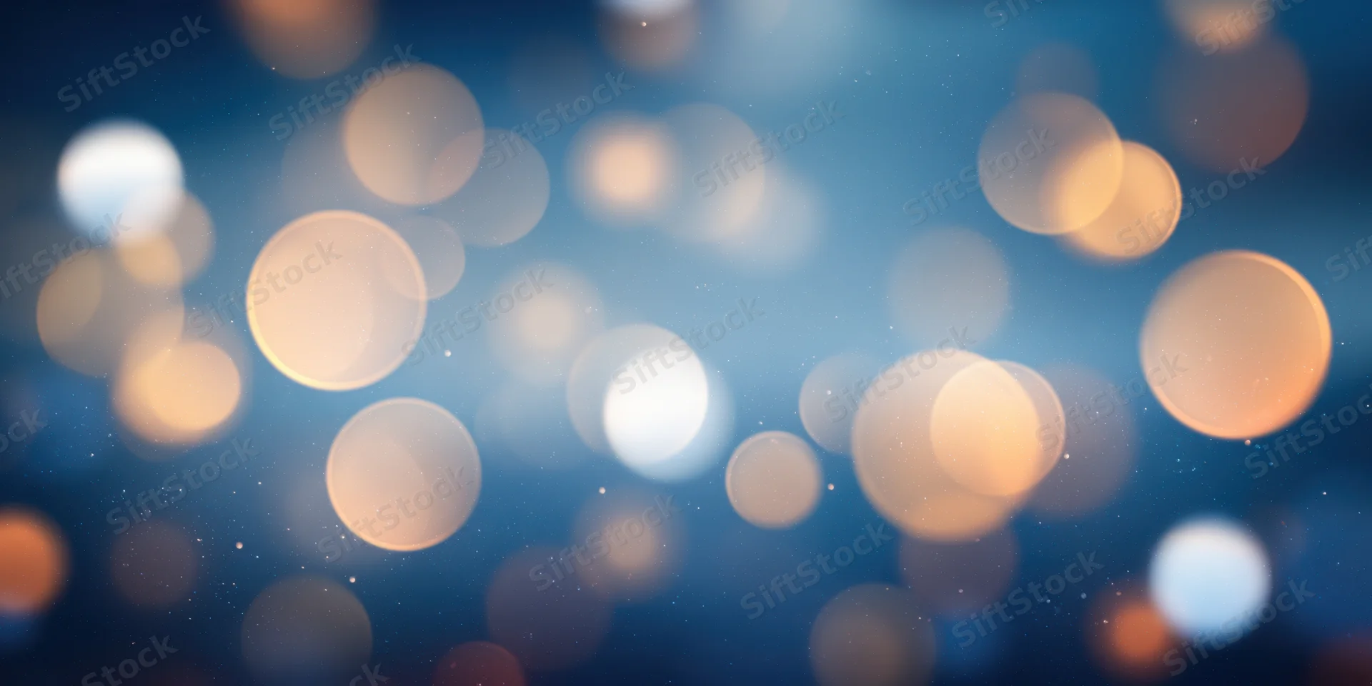 Soft bokeh circles glowing against a blue gradient background