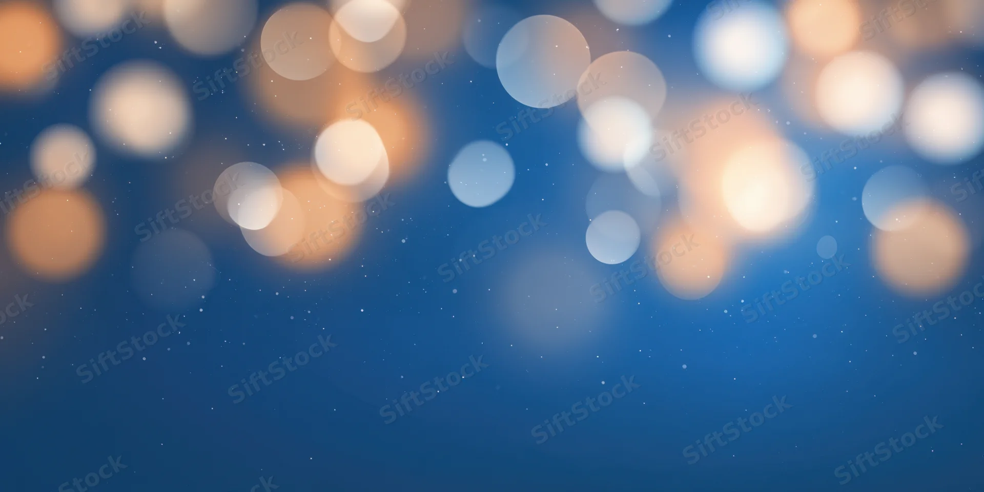 Soft bokeh circles in a blue gradient background with scattered light flares and subtle sparkle