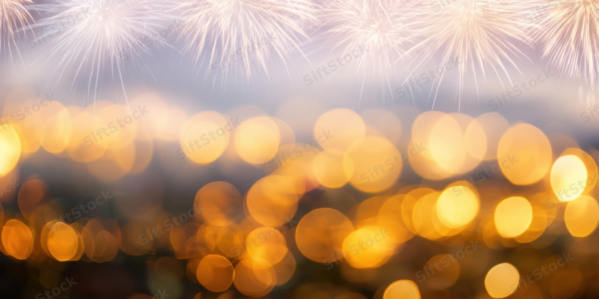 Fireworks exploding above a cityscape with golden bokeh lights at night