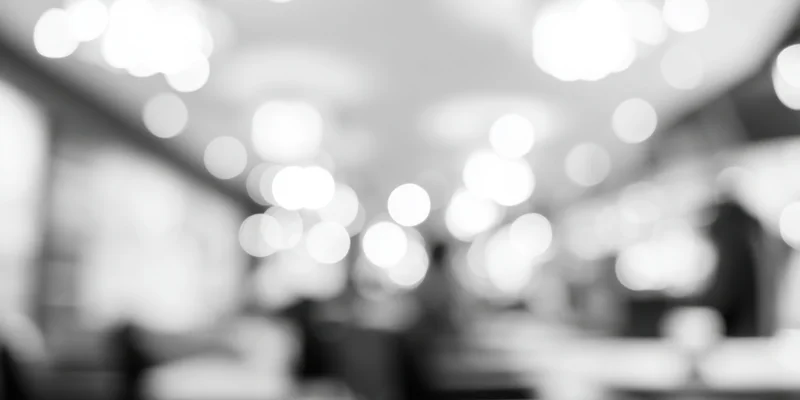 Blurred interior with soft glowing lights on ceiling