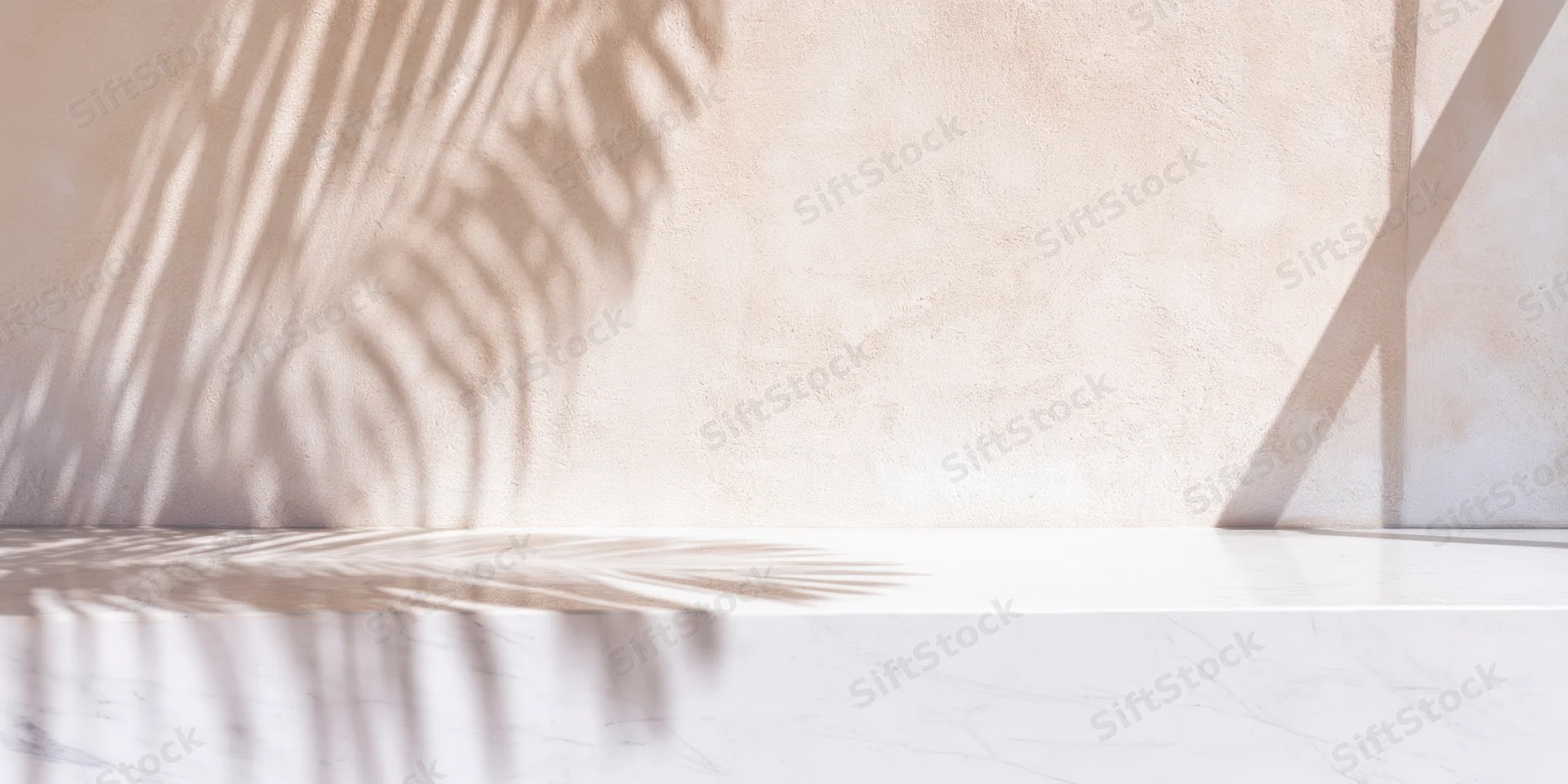 Minimal interior with palm shadow on textured wall and marble surface