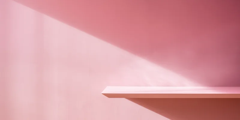 Empty pink shelf in a minimal interior with diagonal light beam casting shadow on wall