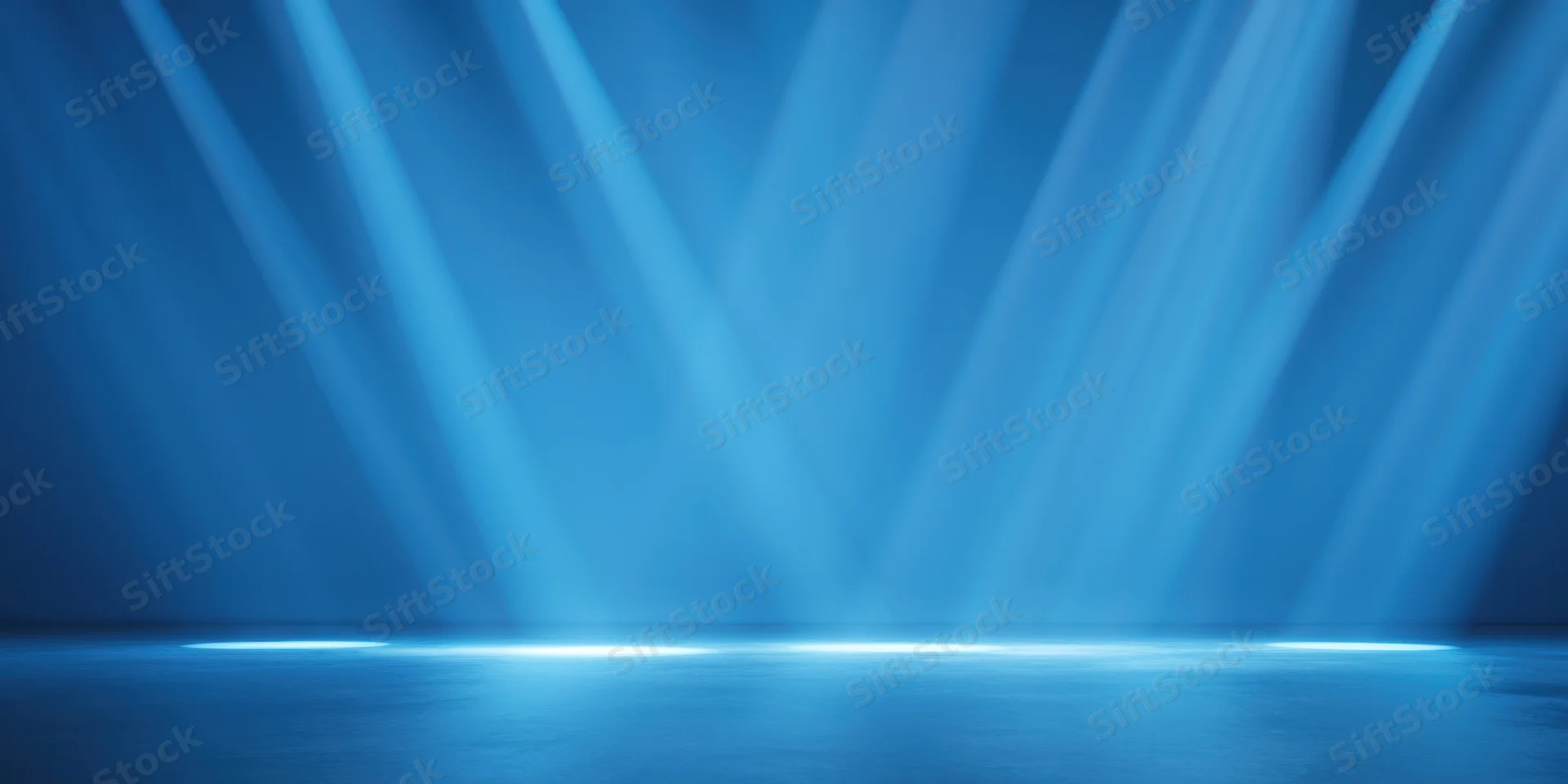 Diagonal blue light beams illuminating a minimalist stage floor