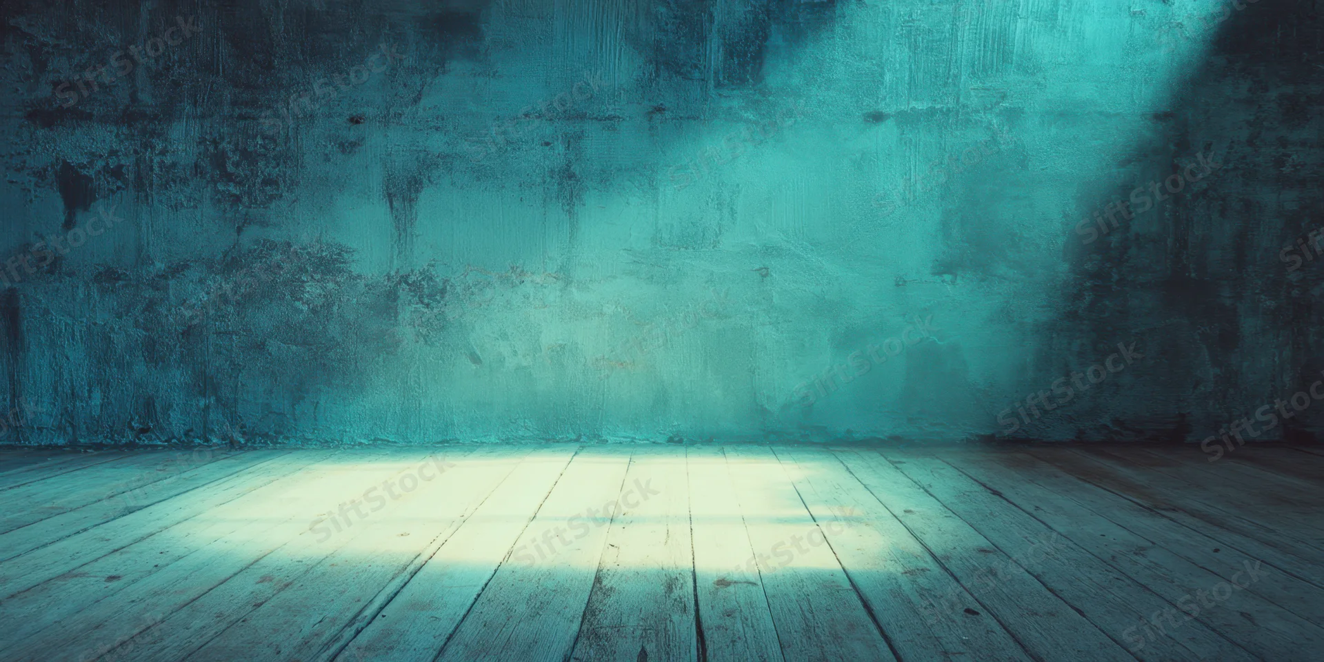 Empty industrial interior with weathered concrete wall and wooden floor under moody blue lighting