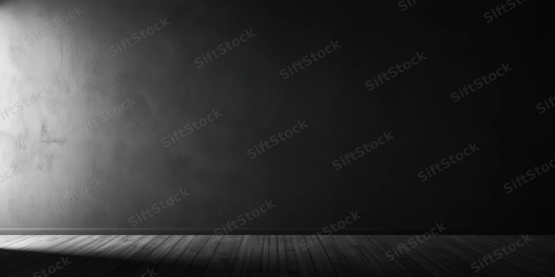 Dark textured concrete wall with wooden floor in empty moody interior space