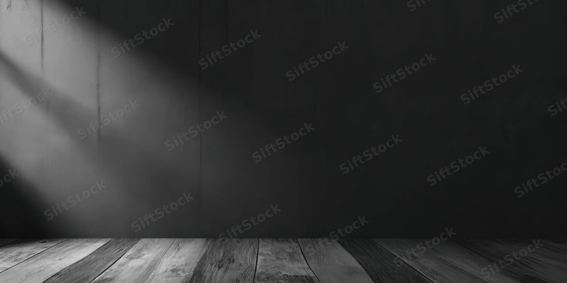 Dark textured wall with wooden floor and diagonal light shadow in empty interior space