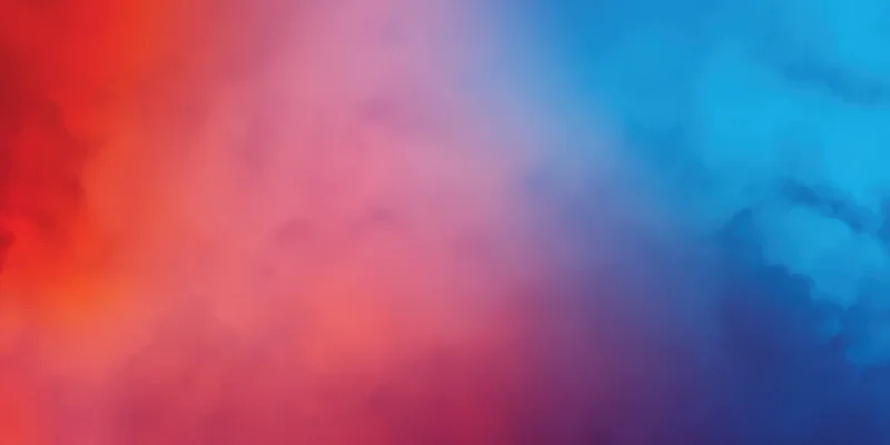 Soft abstract gradient of red and blue smoke blending into pink and purple hues across the frame