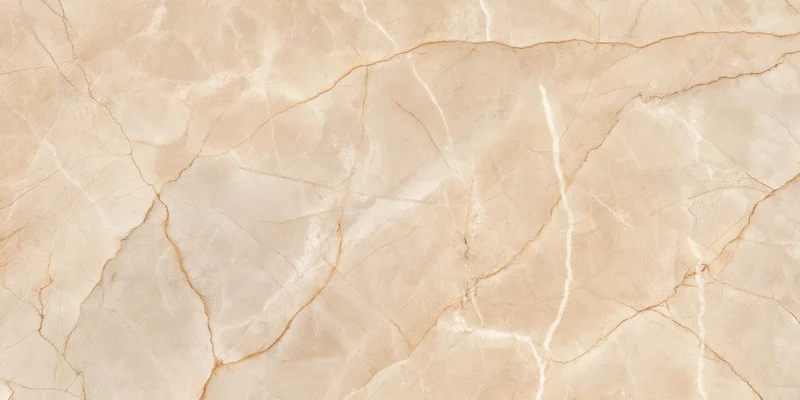 Close-up of a beige marble surface with natural veining and smooth texture