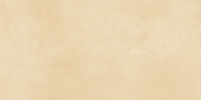 Warm beige textured wall with soft even lighting as interior background