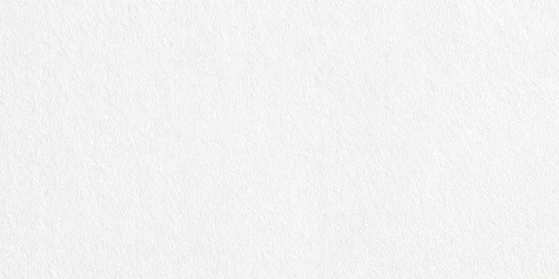 Blank white textured paper surface with subtle grain pattern filling the frame