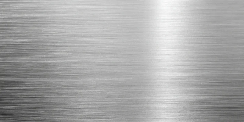 Brushed metal surface with fine horizontal grain and soft sheen