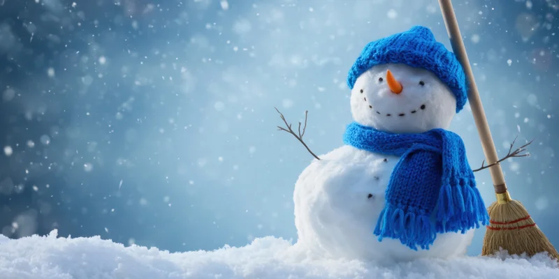 Cheerful snowman wearing blue knitted hat and scarf standing in snow with broom and twig arms